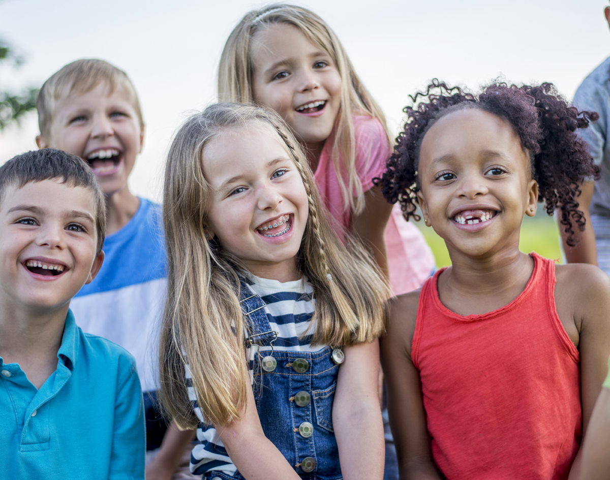 Michael-Riordan-Orthodontics-group-of-children-smiling